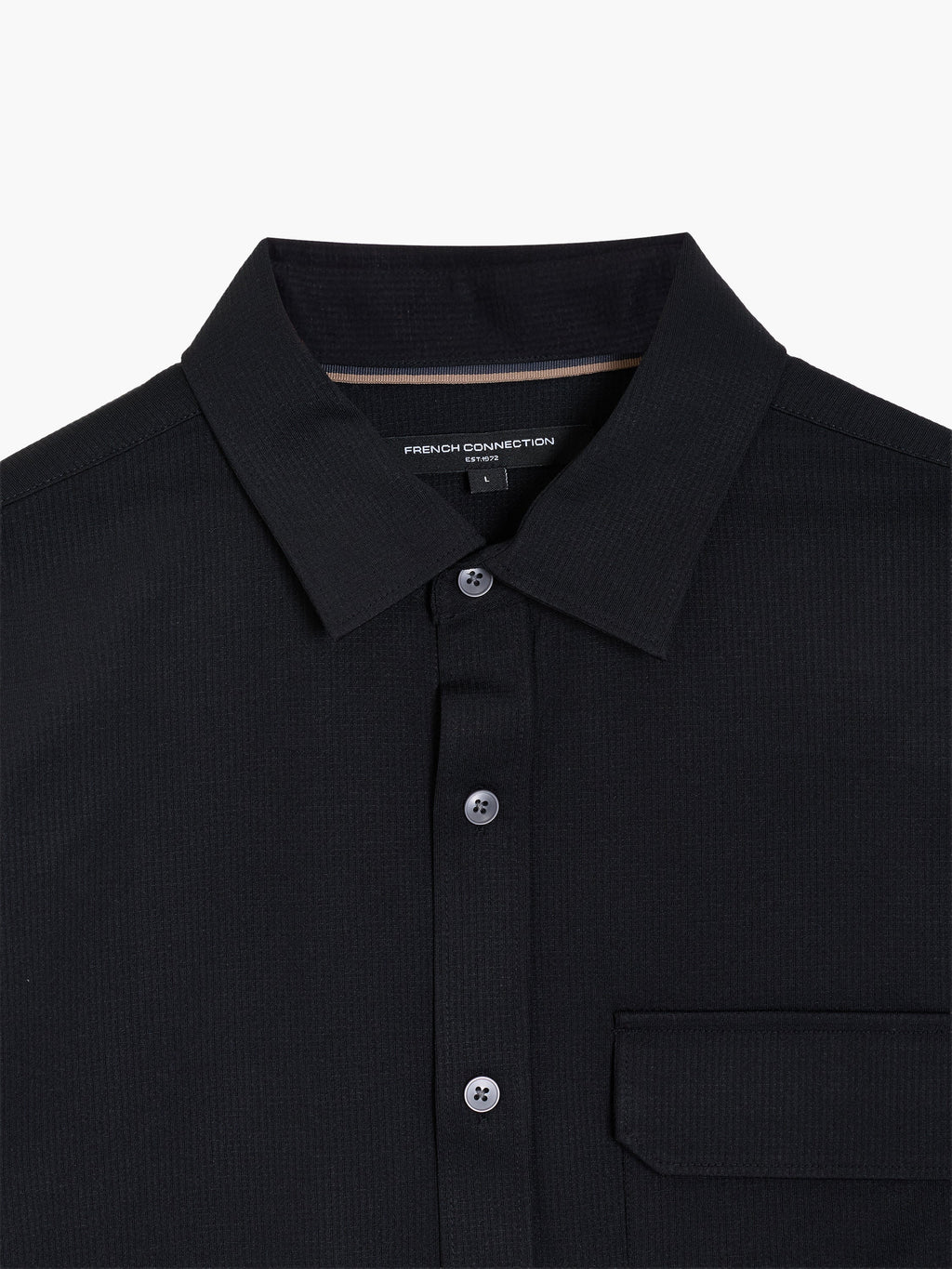 Chemise noire texturée à manches longues et poche