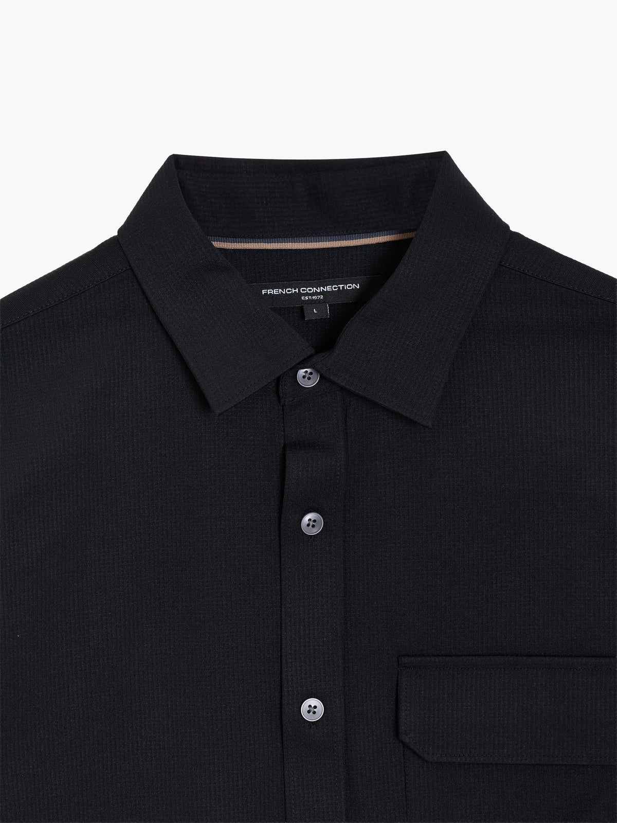 Chemise noire texturée à manches longues et poche