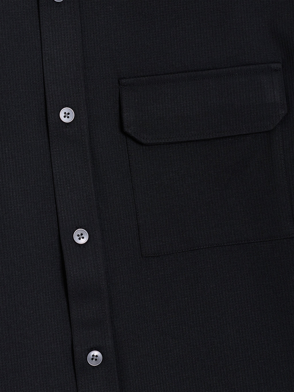 Chemise noire texturée à manches longues et poche