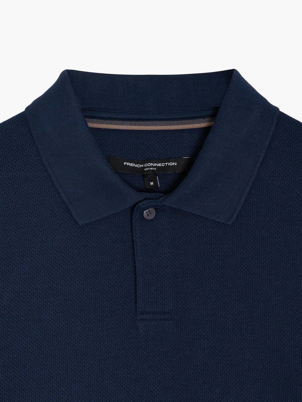 Polo à manches courtes marine avec patte de boutonnage dissimulée