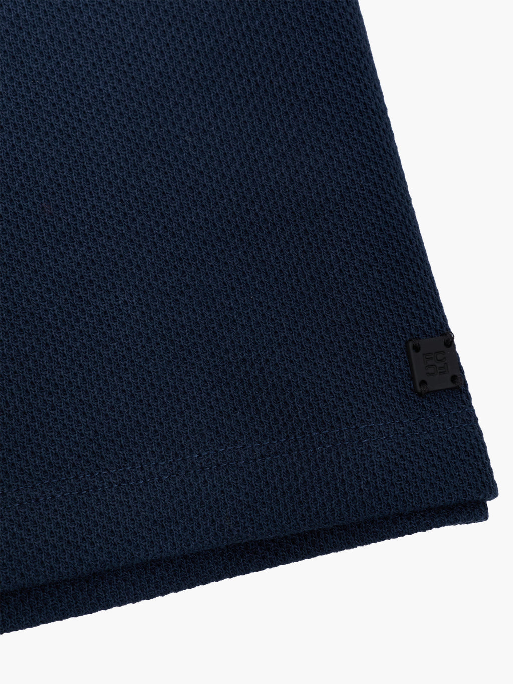 Polo à manches courtes marine avec patte de boutonnage dissimulée