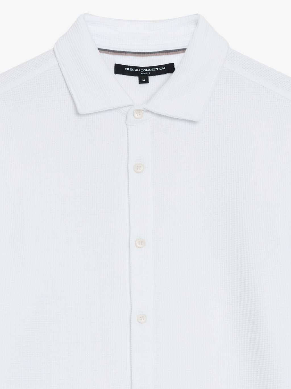 Chemise blanche texturée boutonnée à manches courtes