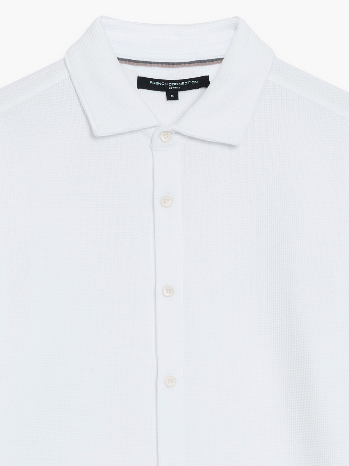 Chemise blanche texturée boutonnée à manches courtes